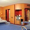 Отель Novotel Suites München Parkstadt Schwabing в Мюнхене