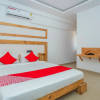 Отель OYO 15111 Greencity Comforts, фото 11
