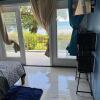 Отель Sea Breeze Studio At Carib Resort, фото 3