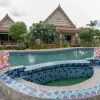Отель Capital O 961 Baan Dow Chompoo Resort, фото 12