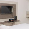 Отель Cozy And Warm Studio At Grand Sentraland Karawang Apartment, фото 1
