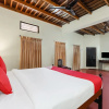 Отель OYO 19168 Alathcad Homestay, фото 3