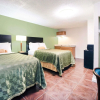 Отель Executive Inn and Kitchenette Suites, фото 6