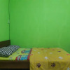 Отель Oyo 2365 Griya Kost Mendut, фото 10