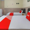 Отель OYO 93976 Maluku Guest House, фото 11