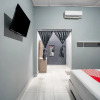 Отель SUPER OYO Gandaria Guest House Near Masjid Raya Sumatera Barat, фото 6