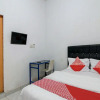 Отель OYO 92111 Dinda Homestay Syariah, фото 6