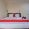 Отель Urbanview Hotel Mon Bel Cibodas by RedDoorz, фото 4