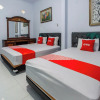 Отель OYO 93976 Maluku Guest House, фото 6