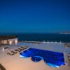 Отель Villa Santorini, Wine Dark Sea Villas, фото 12
