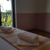 Отель Apartments and Room Caric, фото 2