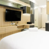 Отель Warm Studio With Access To Mall At Supermall Mansion Apartment, фото 12