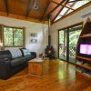 Отель Crater Lakes Rainforest Cottages, фото 1