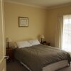 Отель Logans Beach House and Apartments, фото 6