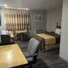 Отель Mid Towne Inn and Suites, фото 4