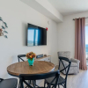 Отель Sandy Feet Retreat Ocean View Condo, фото 13