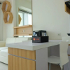 Отель Compact 1BR at Tree Park Apartment, фото 14