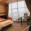 Отель Jinxiu Zhonghua International Hotel, фото 1