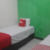 Отель OYO 3449 Putri Garuda Syariah, фото 12