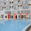 Отель Homey And Elegant Studio Amazana Serpong Apartment, фото 1