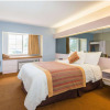 Отель Microtel Inn & Suites by Wyndham Kansas City Airport, фото 2