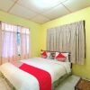 Отель OYO 92503 Penginapan & Villa Sirait, фото 4