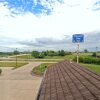 Отель Pleasant Stay Inn & Suites, фото 1