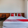 Отель OYO 3759 Delima Guest House Syariah, фото 1
