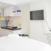 Отель Homey and Minimalist Studio Padina Apartment, фото 2