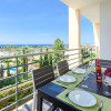 Отель Sea view Apartment with sunbathing Terrace & 2 Swimming pools, фото 15