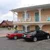 Отель River Road Motel, фото 1