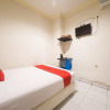 Отель RedDoorz Near Ambon Plaza, фото 12