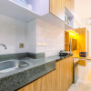 Отель Modern And Comfy Studio At Transpark Cibubur Apartment, фото 8