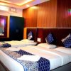 Отель Rooms with 1 king size bedded + 2 single Cart Beds + AC, фото 13
