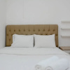 Отель Gorgeous and Cozy 2BR at Bassura City Apartment, фото 12