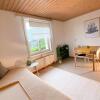 Отель NEB-THUN LODGE`s Appartement 1 Hilterfingen Ringstrasse 6 в Хюнибахе