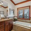 Отель Exclusive 4 Bedroom Ski in, Ski out Vacation Rental With Hot Tubs and Heated Outdoor Pool in Lionshe, фото 4