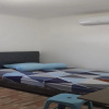 Отель SPOT ON 91616 Kharisma Guest House, фото 7