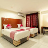 Отель OYO Flagship 1481 Apartemen Sentraland Medan, фото 3