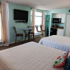 Отель Beach Colony Unit 900, фото 5