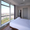 Отель Minimalist With Beautiful View 2Br At Grand Sungkono Lagoon Apartment, фото 12