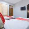 Отель Taman Mekar Beach Inn 2 by Oyo Rooms, фото 12