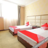 Отель Oyo Xingyi Wanshun Business Hotel, фото 3