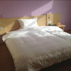 Отель 7Days Inn ¿¿mqi Xibei Road Ming Garden, фото 7