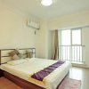 Отель Dalian Xuanyi Selected Holiday Apartment, фото 2