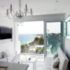 Отель The White Pearl Suite - beach front city centre with sea view., фото 12