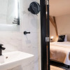 Отель limehome Amsterdam Leidsekruisstraat, фото 26