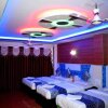 Отель Rooms with 1 king size bedded + 2 single Cart Beds + AC, фото 9