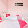 Отель OYO 2061 Rizki Dhira Guest House Syariah, фото 4
