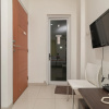 Отель RedDoorz @ Tirta Mansion Karawaci, фото 8